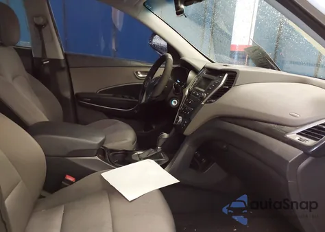 2014 Hyundai Santa Fe Sport 2.4L z USA, uszkodzony, nr VIN 5XYZU3LB9EG218191